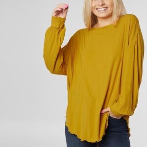 NWT free people shimmy Shake untamed Gold long sleeve top size medium